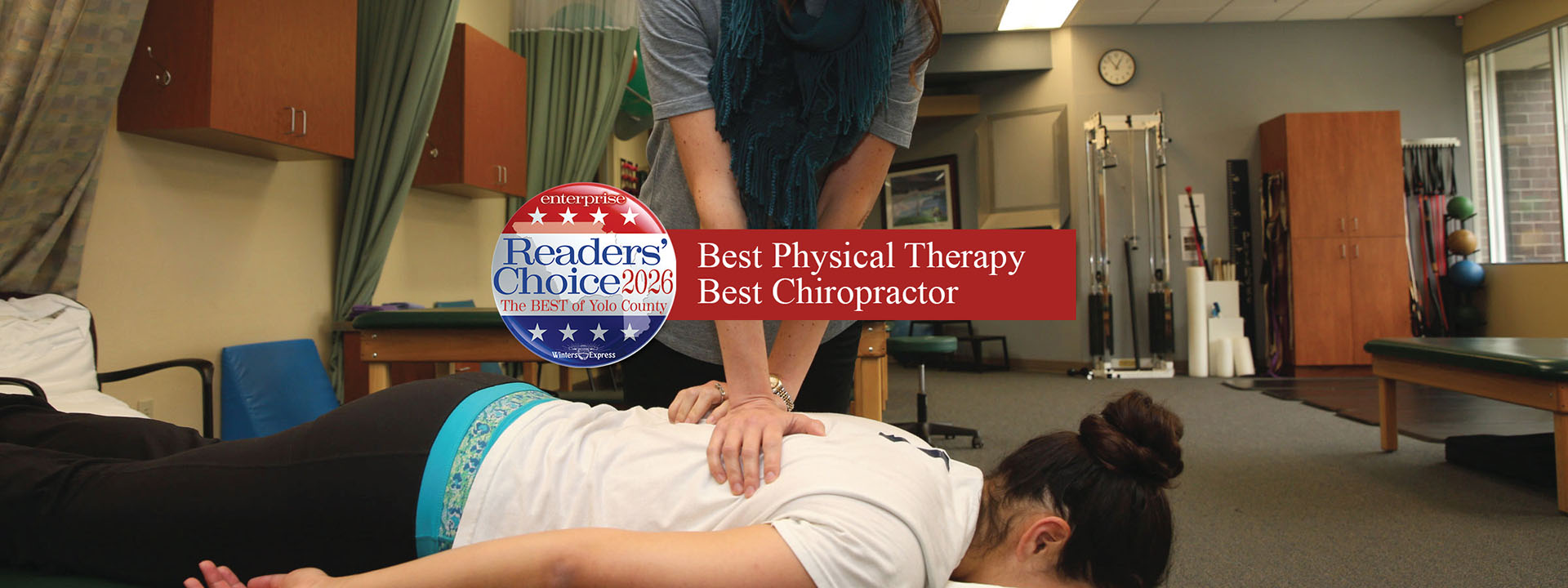 Chiropractor adjusting the back of a patient